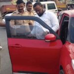 Ranjangaon Police Traffic Action : Traffic police checking car documents during road enforcement drive in India under Ministry of Road Transport and Highways rules