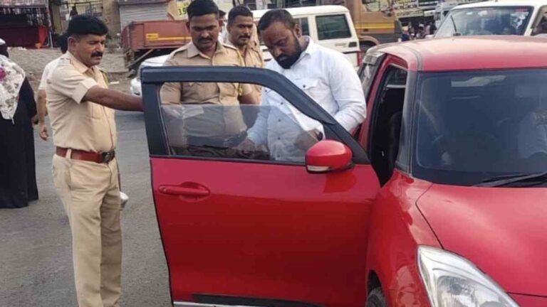 Ranjangaon Police Traffic Action : Traffic police checking car documents during road enforcement drive in India under Ministry of Road Transport and Highways rules